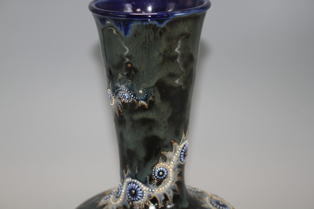 George Tinworth for Doulton Lambeth, a Persian shape bottle vase, dated 1880, 26cm, restored foot